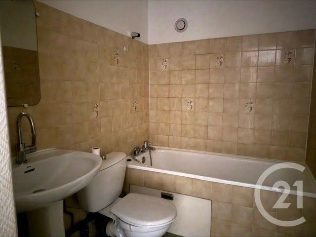 Appartement T1 à louer - 2 pièces - 35.68 m2 - BRESSOLS - 82 - MIDI-PYRENEES - Century 21 Riquelme Immobilier